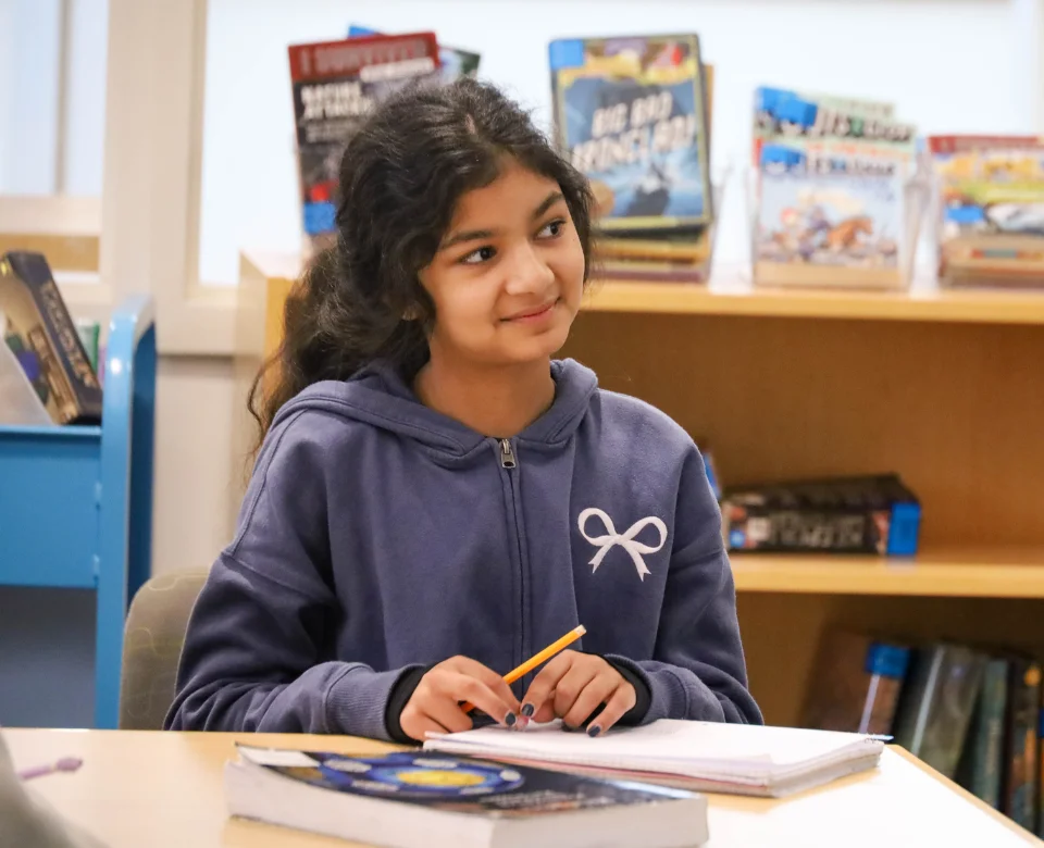 Female student listening in class