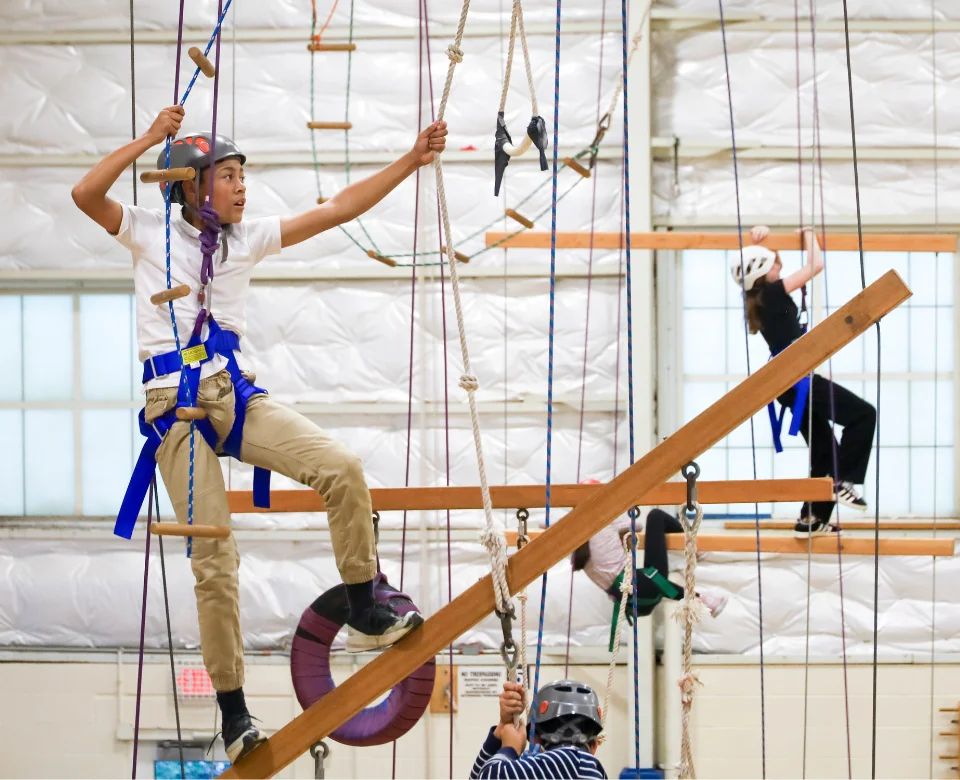 Students traversing obstacle course