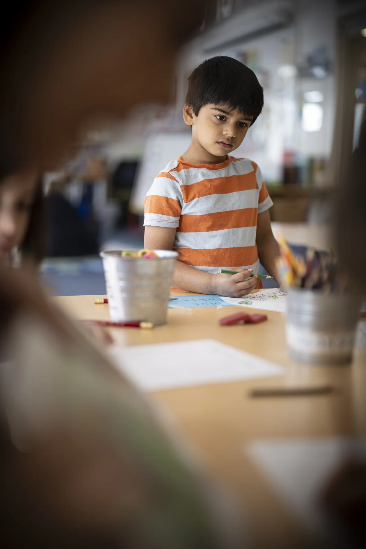 young student drawing